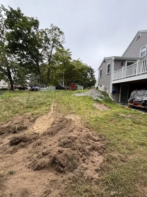 New Lawn & Retaining Wall With Built-In Staircase in Norfolk, MA by LD Landscape & Construction — photo 2