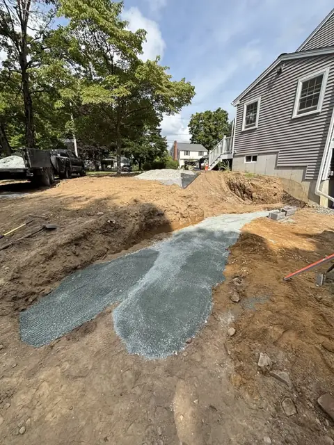 New Lawn & Retaining Wall With Built-In Staircase in Norfolk, MA by LD Landscape & Construction — photo 6