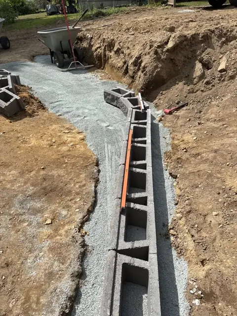New Lawn & Retaining Wall With Built-In Staircase in Norfolk, MA by LD Landscape & Construction — photo 8