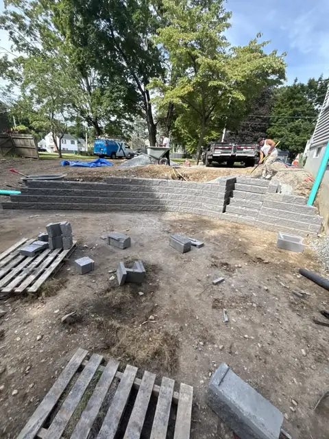 New Lawn & Retaining Wall With Built-In Staircase in Norfolk, MA by LD Landscape & Construction — photo 13