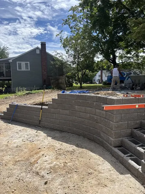 New Lawn & Retaining Wall With Built-In Staircase in Norfolk, MA by LD Landscape & Construction — photo 15