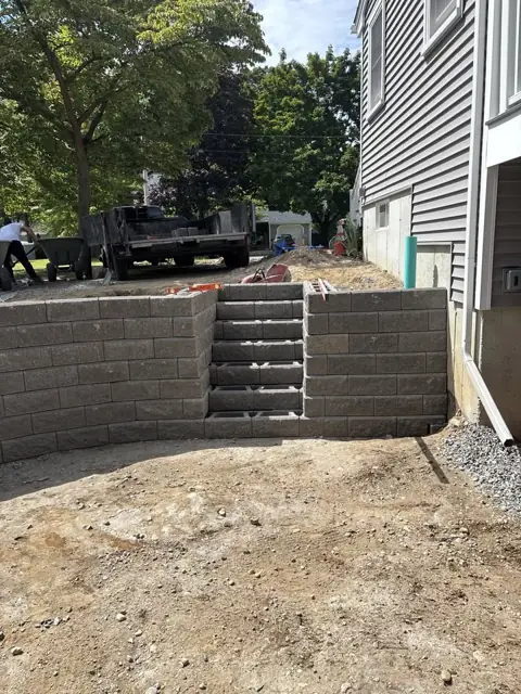New Lawn & Retaining Wall With Built-In Staircase in Norfolk, MA by LD Landscape & Construction — photo 16