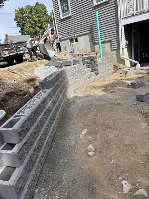 New Lawn & Retaining Wall With Built-In Staircase in Norfolk, MA by LD Landscape & Construction — photo 17