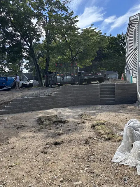 New Lawn & Retaining Wall With Built-In Staircase in Norfolk, MA by LD Landscape & Construction — photo 18