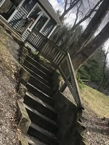 Old Staircase Rebuilt With Paver Treads in Norfolk, MA by LD Landscape & Construction — photo 1