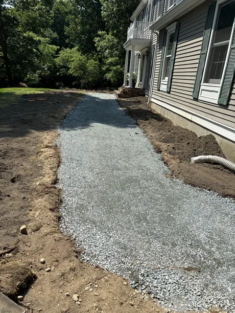 Asphalt Walkway Replaced With Pavers & Flower Beds in Norfolk, MA by LD Landscape & Construction — photo 3